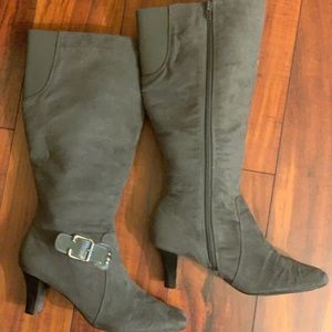 Black suede and grey suede heeled boots.
